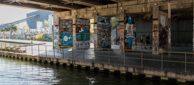 Street art under a bridge on the Canal de l'Ourcq in Paris